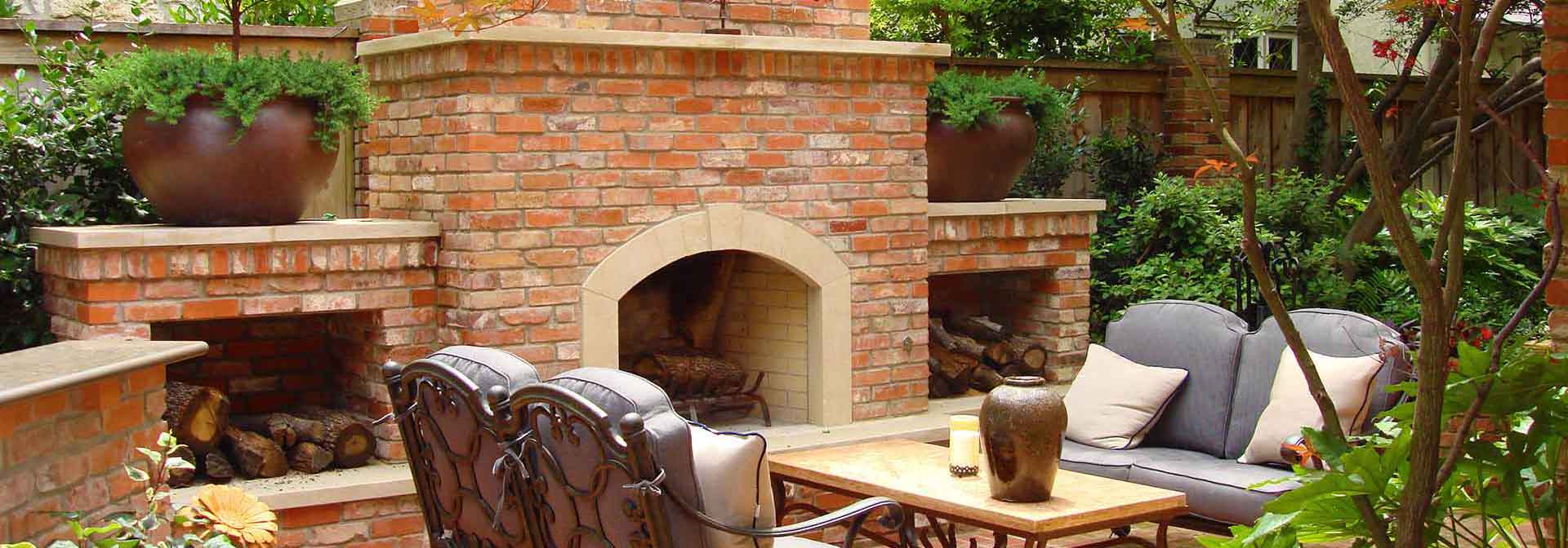 Outdoor Fireplace by Southern Land Design of Dallas - Fort Worth